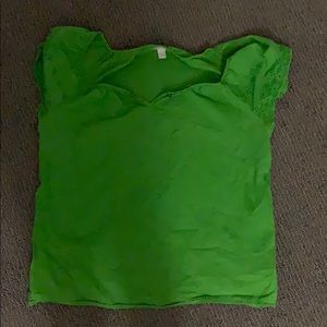 a green women’s top